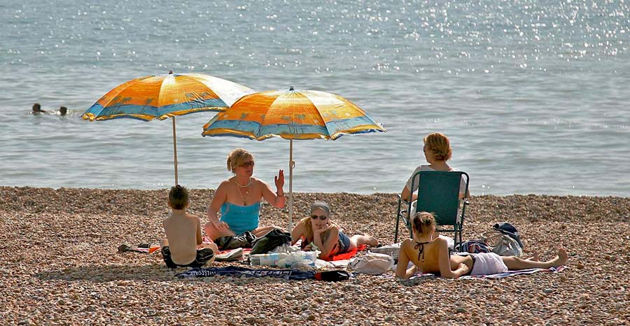 People enjoying Bexhill beach