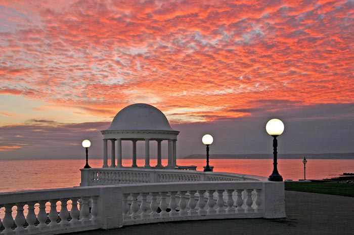 An orange sunset at the Colonnade