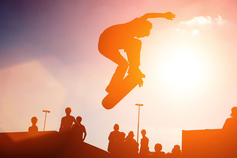 Skateboarder at sunset