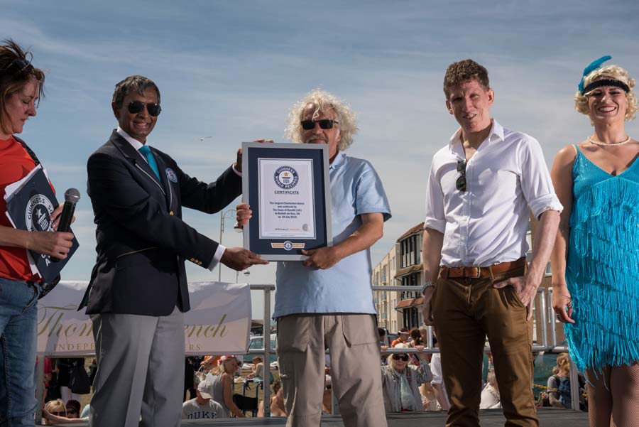 Roger Crouch is awarded the Guinness World Record certificate on behalf of Bexhill